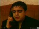 Adrian Copilul Minune vorbeste la telefon