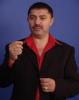 Nicolae Guta in costum negru